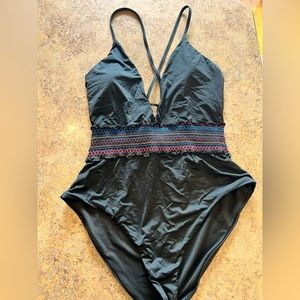 High cut one piece bathing suit